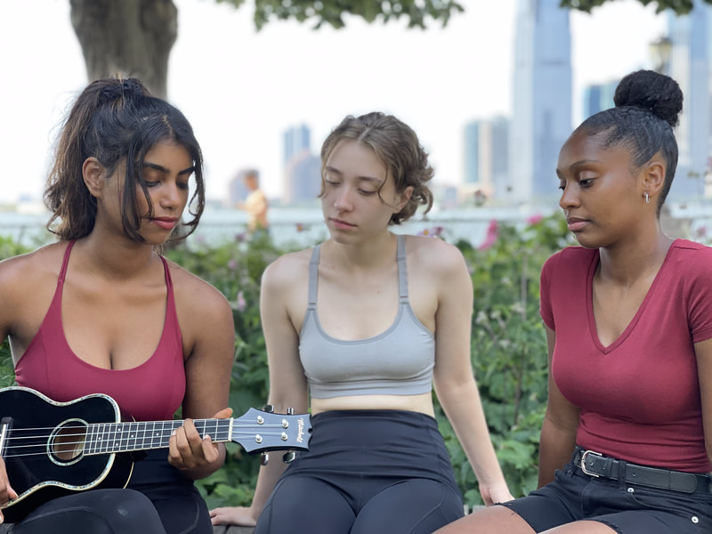 Developing Artists, Harvey, Abigail, & Brianna, gathered at Battery Park for DA Summer Sessions 2021.